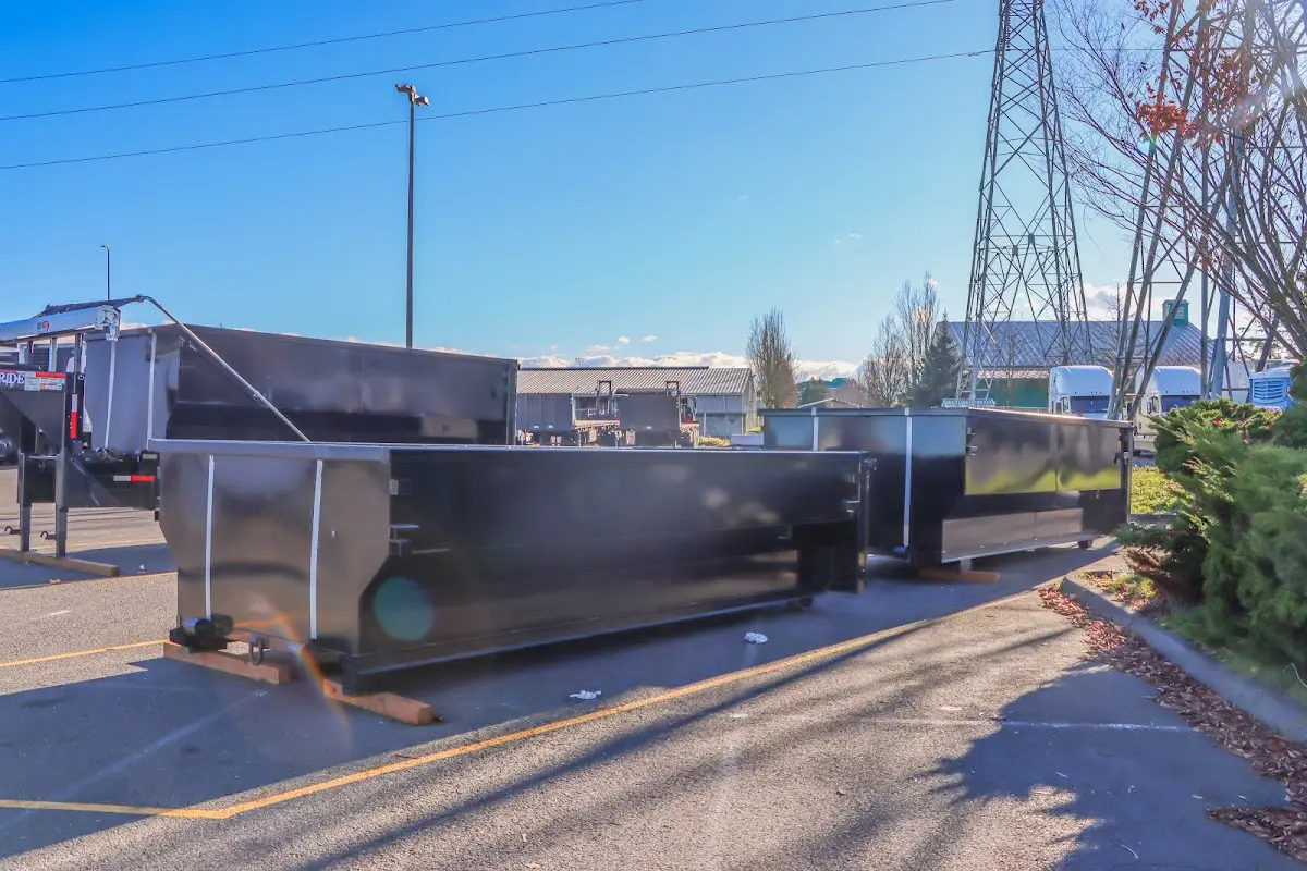 Roll-off dumpster ready for waste disposal at job site for 6 Yard Dumpster Rental in Williams